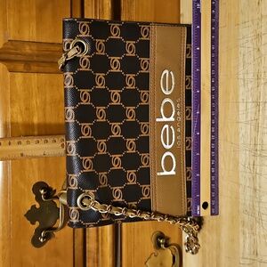 bebe Serena Monogram Shoulder Bag. Black with Gold Accents. Designer.